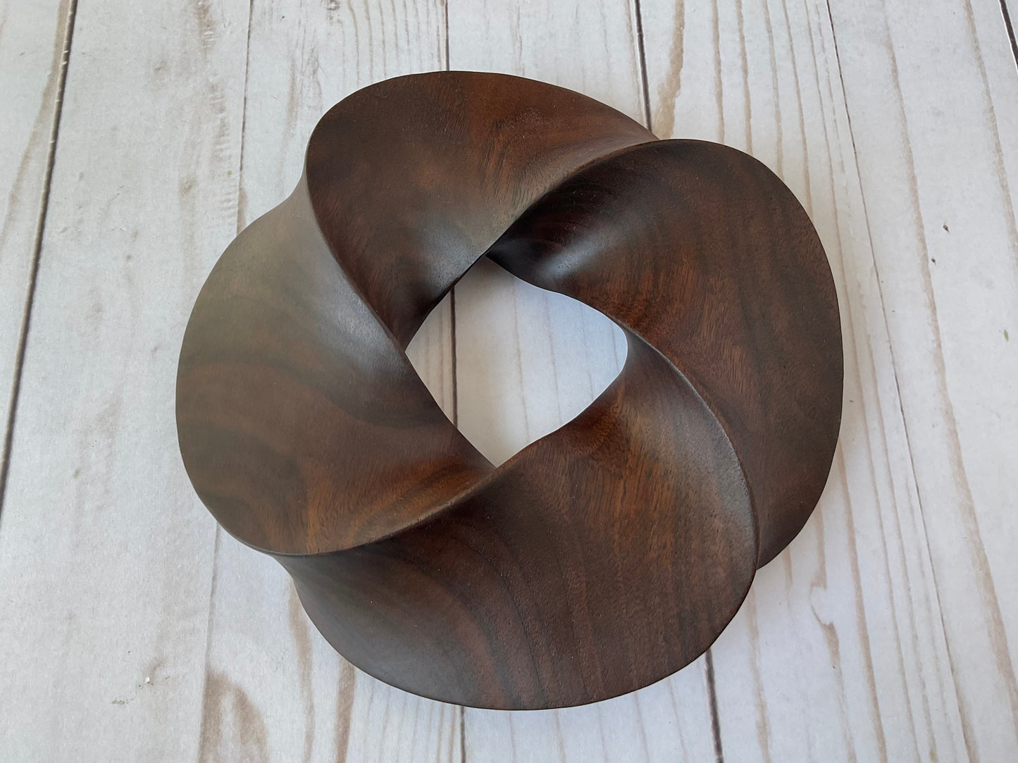 Quadruple-folded Möbius Strip-like Walnut Wood Carving, 7" diameter