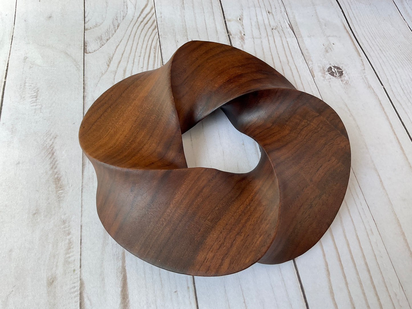 Quadruple-folded Möbius Strip-like Walnut Wood Carving, 7" diameter