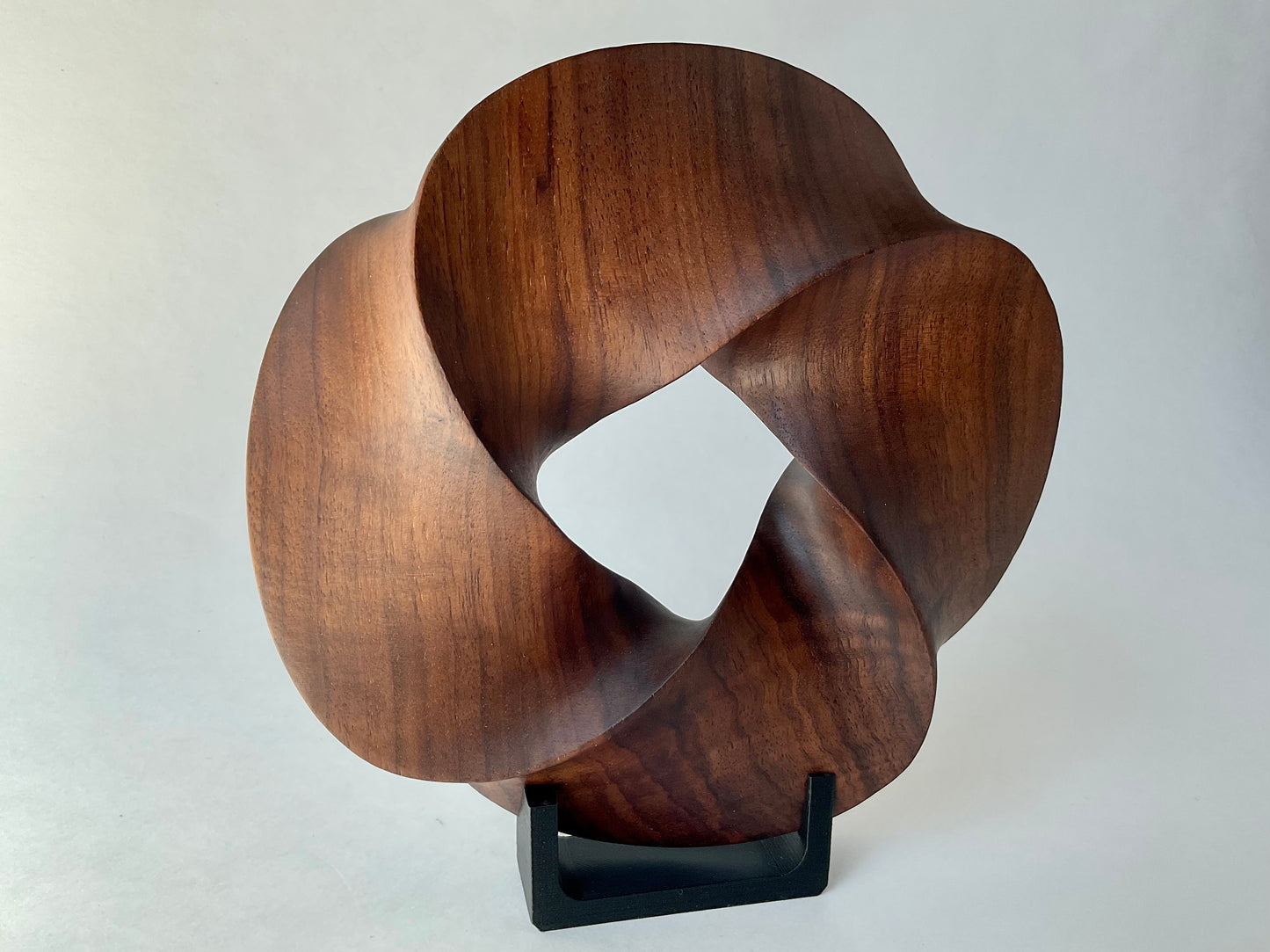 Quadruple-folded Möbius Strip-like Walnut Wood Carving, 7" diameter