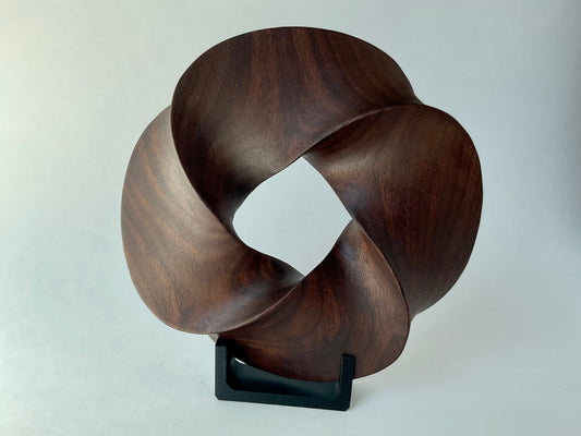 Quadruple-folded Möbius Strip-like Walnut Wood Carving, 7" diameter