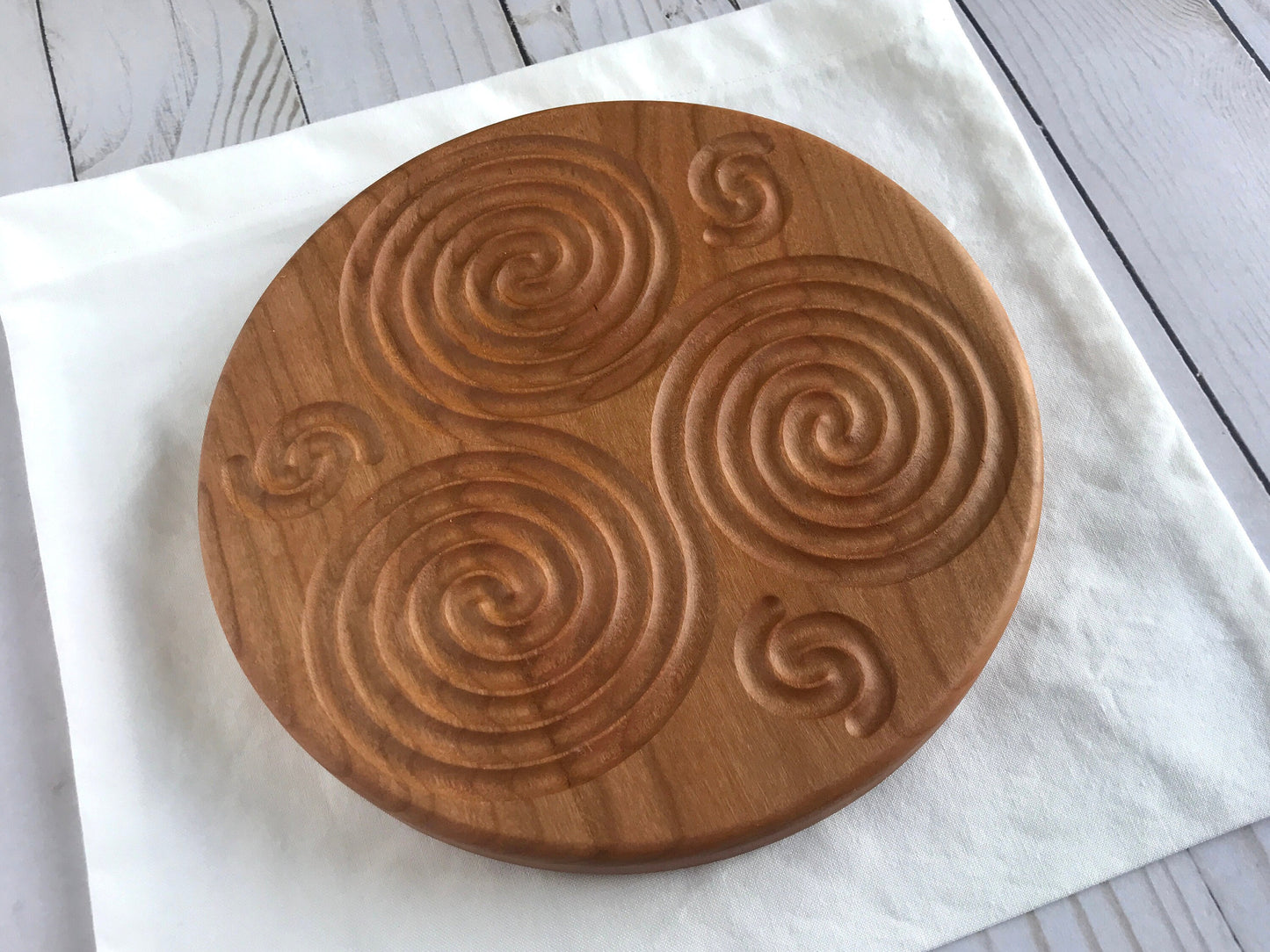 Triskelion Finger Labyrinth in Cherry Wood, 7.5" diameter