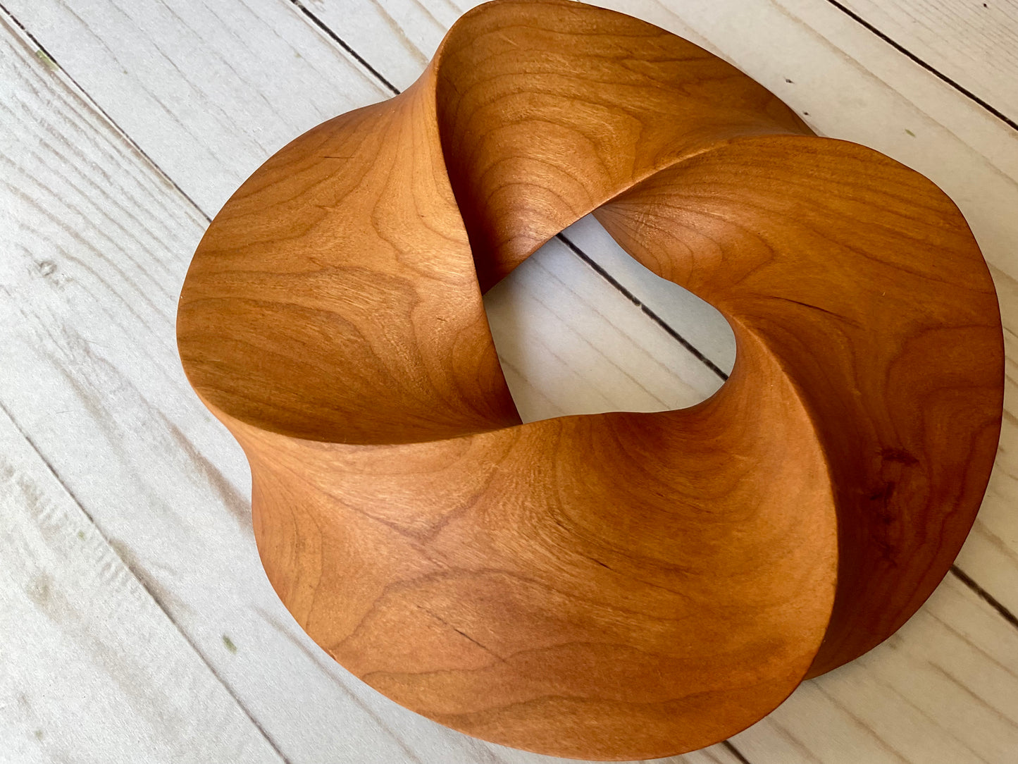 Quadruple-folded Möbius Strip-like Cherry Wood Carving, 7" diameter