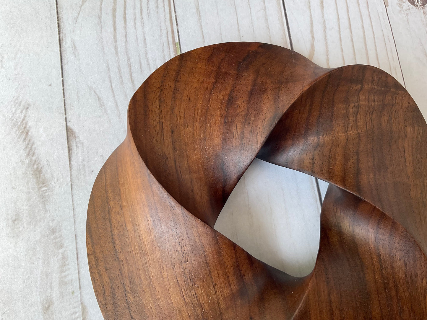 Quadruple-folded Möbius Strip-like Walnut Wood Carving, 7" diameter