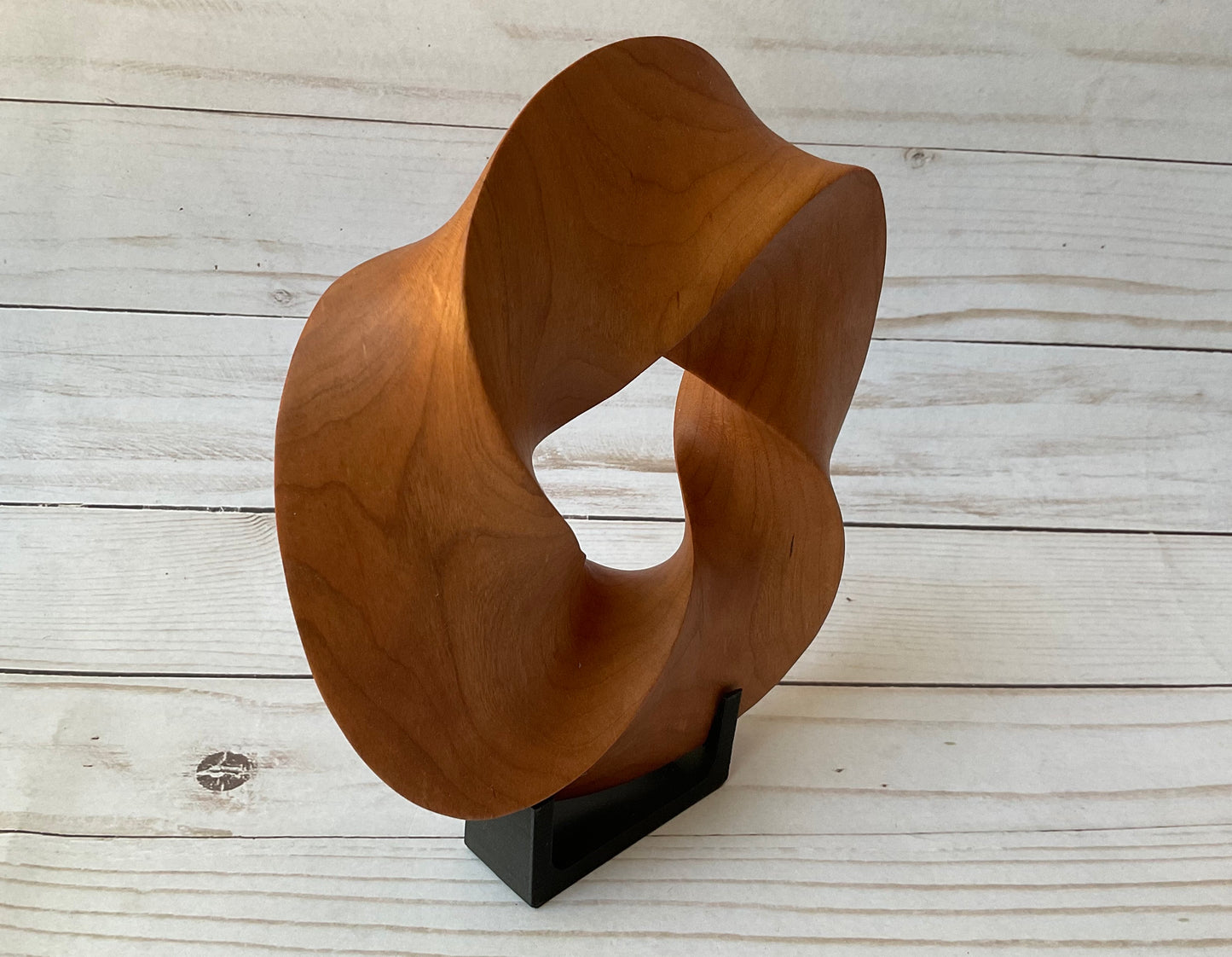 Quadruple-folded Möbius Strip-like Cherry Wood Carving, 7" diameter