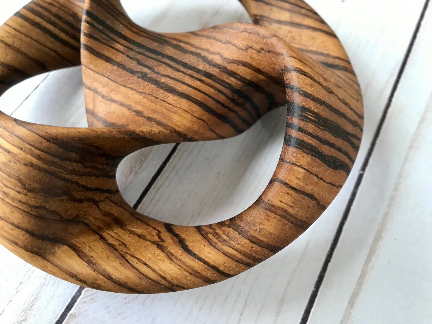 Triquetra Mobius Strip-like Wooden Sculpture, ZebraWood, 5"